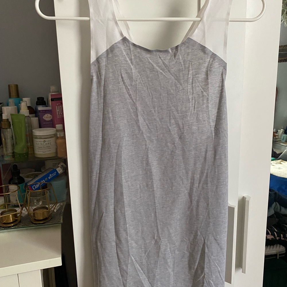Gray and white (mesh) Dry fit Nike top. Very comfy. Size S.